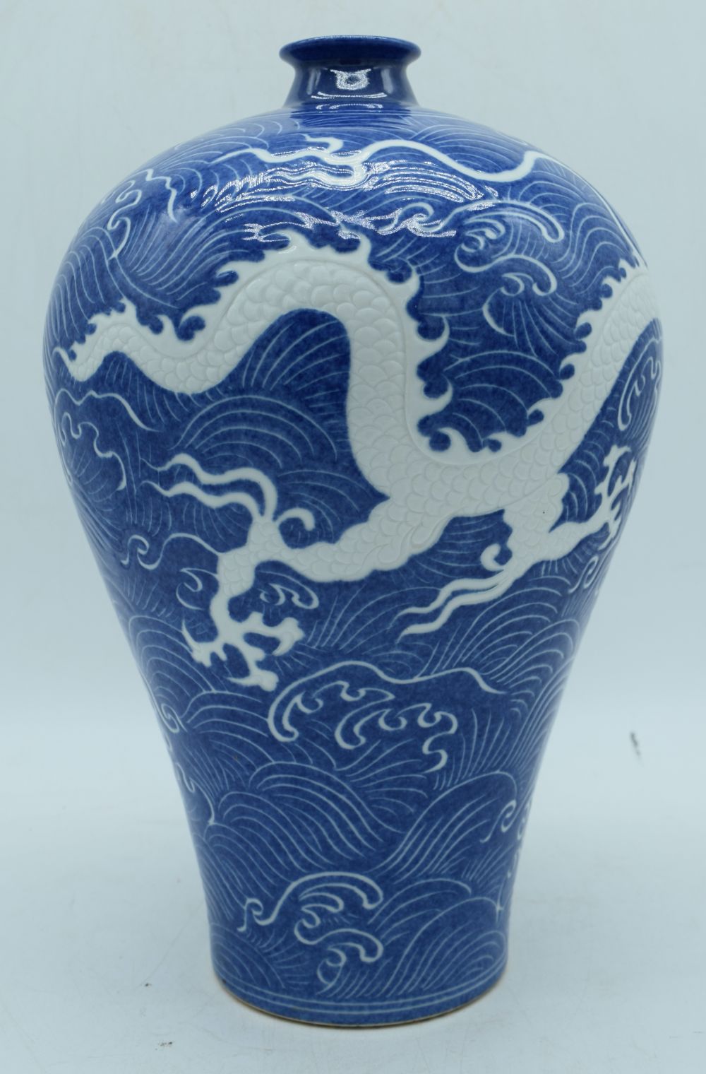 A Chinese porcelain Meiping vase decorated with a Dragon and cloud pattern in relief 37 cm. - Image 6 of 8