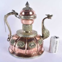 A LARGE 19TH CENTURY TIBETAN REPOUSSE WHITE METAL AND COPPER EWER decorated with dragons and