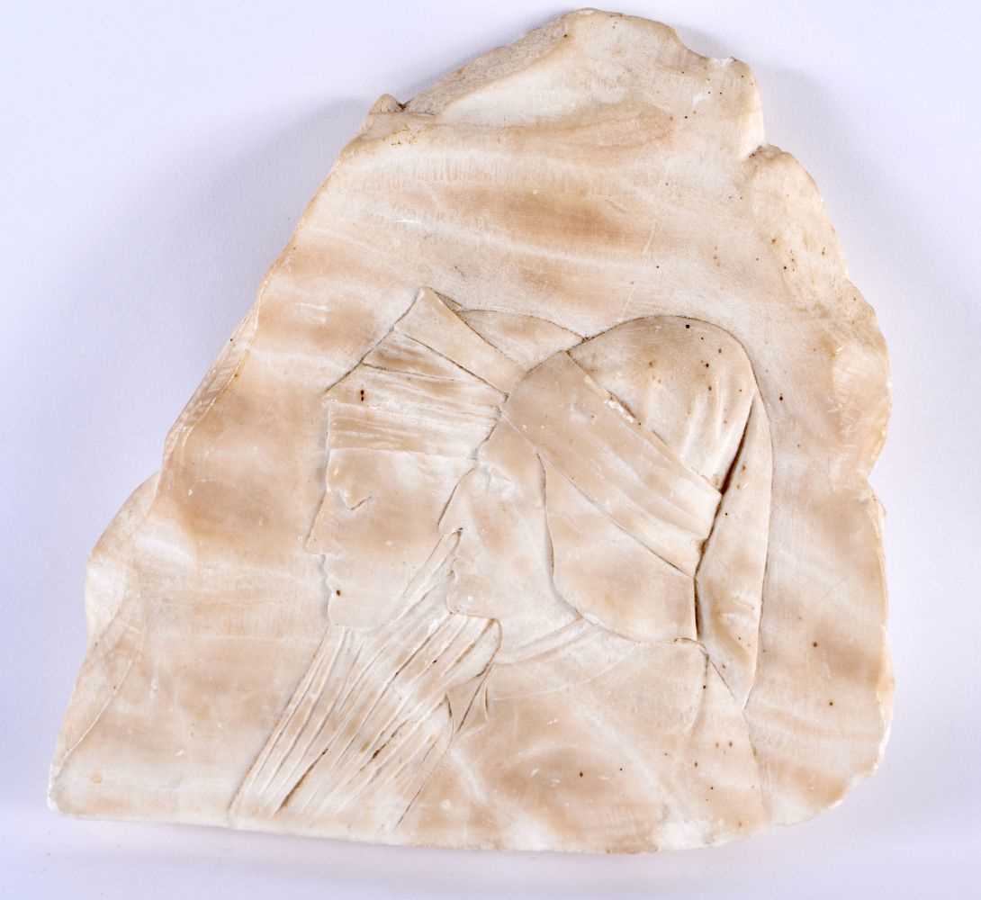 A 19TH CENTURY ITALIAN GRAND TOUR CARVED ALABASTER FRAGMENT depicting two side profiles. 18cm x 15