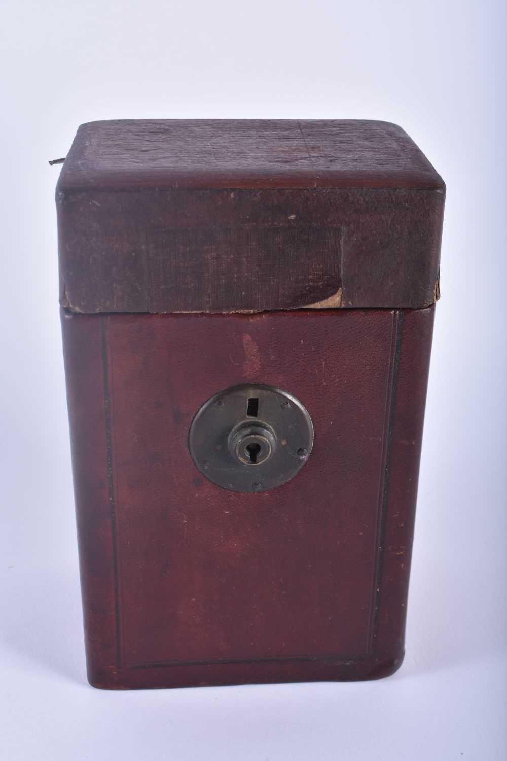 A RARE LATE VICTORIAN LEATHER CASED TRAVELLING BARBERS KIT with fitted interior. Box 21 cm x 10 cm.