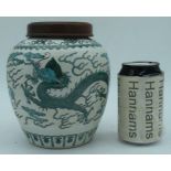 A Chinese Qing Dynasty porcelain Jar with hardwood cover decorated with a Dragon 18cm.