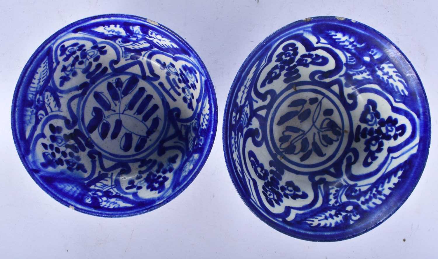 TWO ANTIQUE PERSIAN SAFAVID BLUE AND WHITE POTTERY BOWLS. Largest 18cm wide. (2) - Image 3 of 4