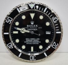 A Contemporary Rolex style dealership clock 33 cm.