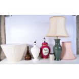 A collection of Porcelain and wooden table lamps including Wedgewood largest 33 cm. (4).