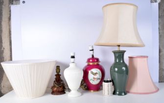A collection of Porcelain and wooden table lamps including Wedgewood largest 33 cm. (4).