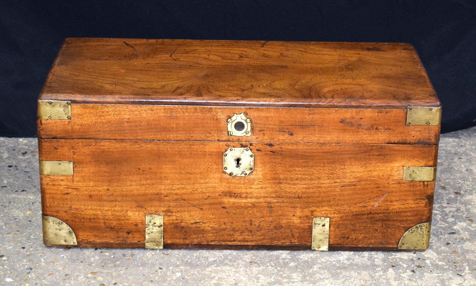 An antique Camphor wood Campaign chest 28 x 60 x 31 cm.