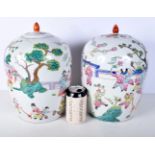 A pair of Chinese porcelain polychrome lidded jars decorated with figures 30cm (2).