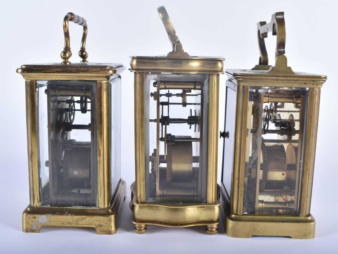 THREE ANTIQUE FRENCH BRASS CARRIAGE CLOCKS 14.25cm high inc handle. (3) - Image 4 of 6