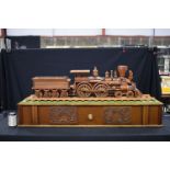 A large electrically powered wooden model train