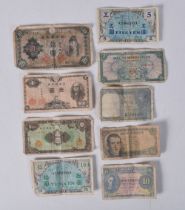 A Collection of International Bank Notes including Spanish 5 Pesetas, Malaya 10 Cents, India 1