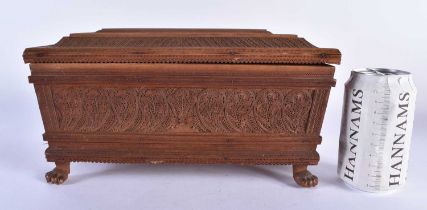 A FINE MID 19TH CENTURY ANGLO INDIAN CARVED WOOD CASKET AND COVER decorated with mythical birds,