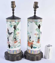 A PAIR OF EARLY 20TH CENTURY CHINESE FAMILLE ROSE PORCELAIN WIG STAND LAMPS Late Qing/Republic. 47