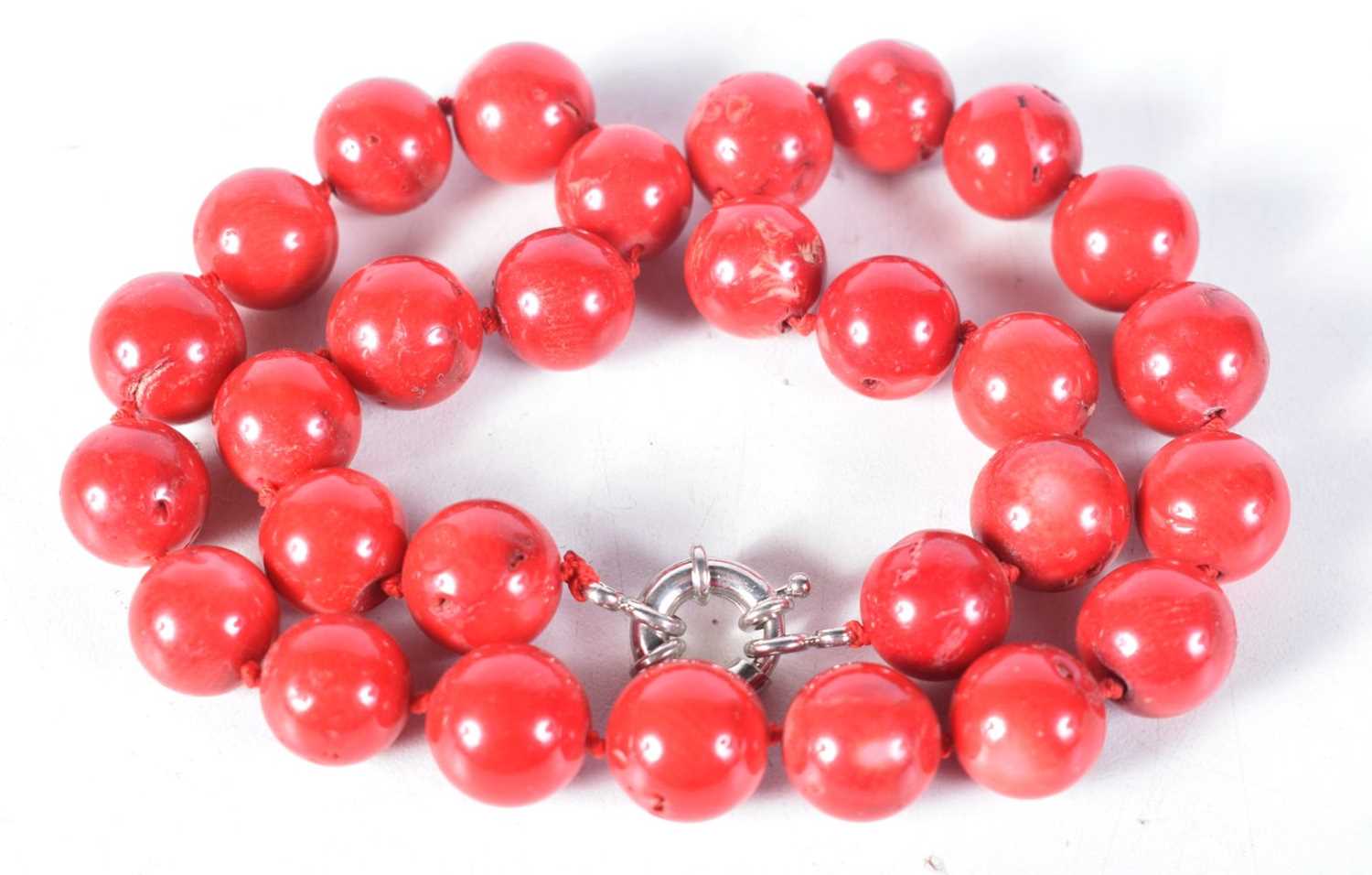 A Red Bead Necklace. 47cm long, Bead Size 14.4mm, weight 123g