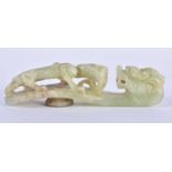 A LARGE EARLY 20TH CENTURY CHINESE CARVED JADE BELT HOOK Late Qing/Republic. 14 cm long.