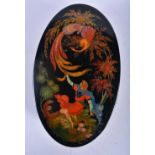 A RUSSIAN BLACK LACQUER BOX AND COVER depicting a figure and a bird amongst foliage. 13 cm x 8 cm.