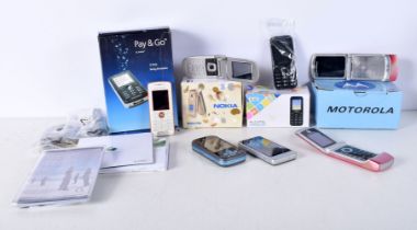 A collection of mobile phones (7).
