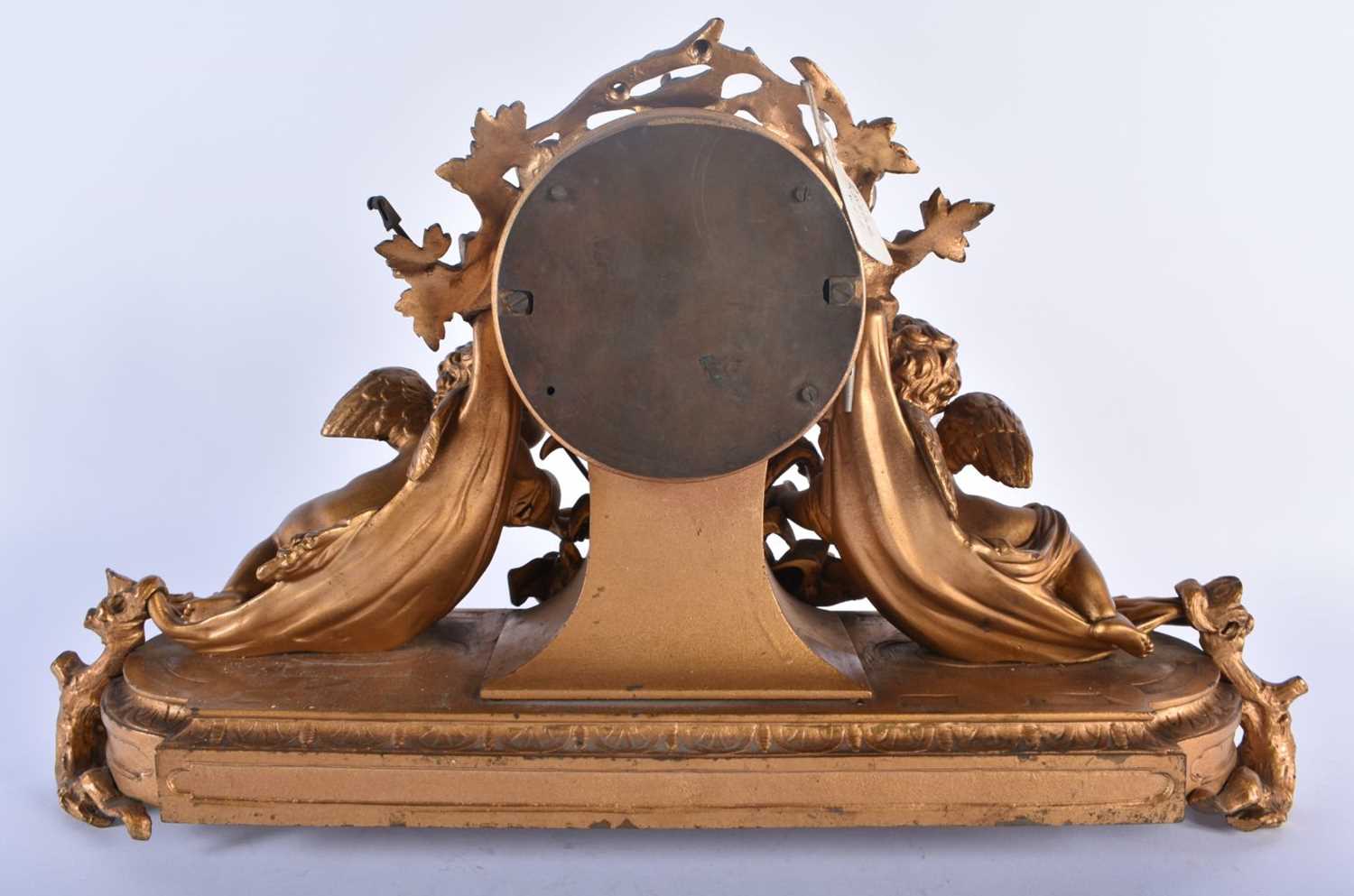 A LARGE 19TH CENTURY FRENCH BRONZE MANTEL CLOCK formed with a central drum encased by two putti. - Image 5 of 7