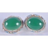 A Pair of White Metal and Enamel Earrings set with Jade Cabochons. 1.9cm x 1.6 cm, weight 9.7g