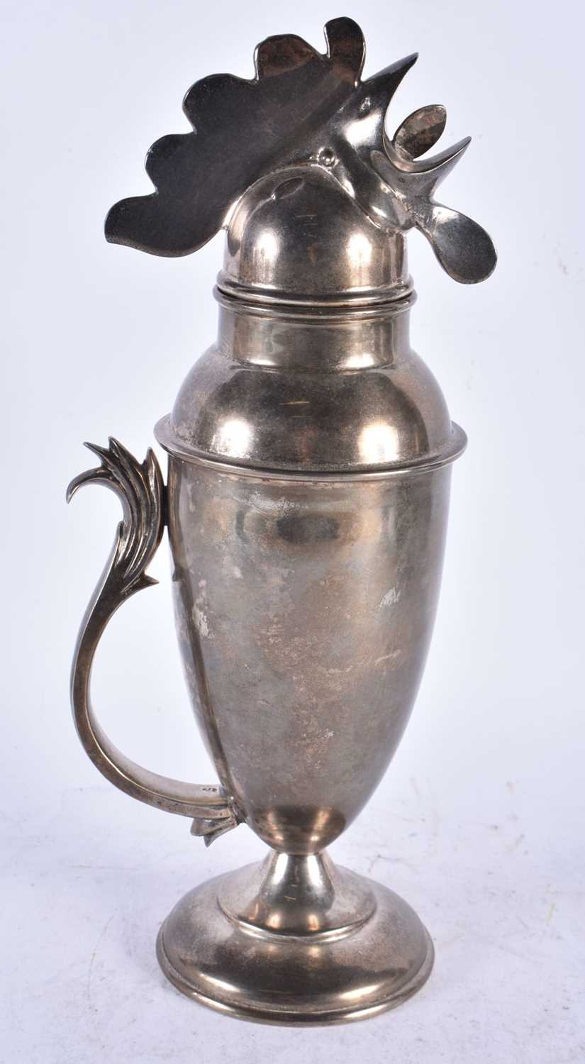 A HEN SILVER PLATED COCKTAIL SHAKER. 33 cm high.