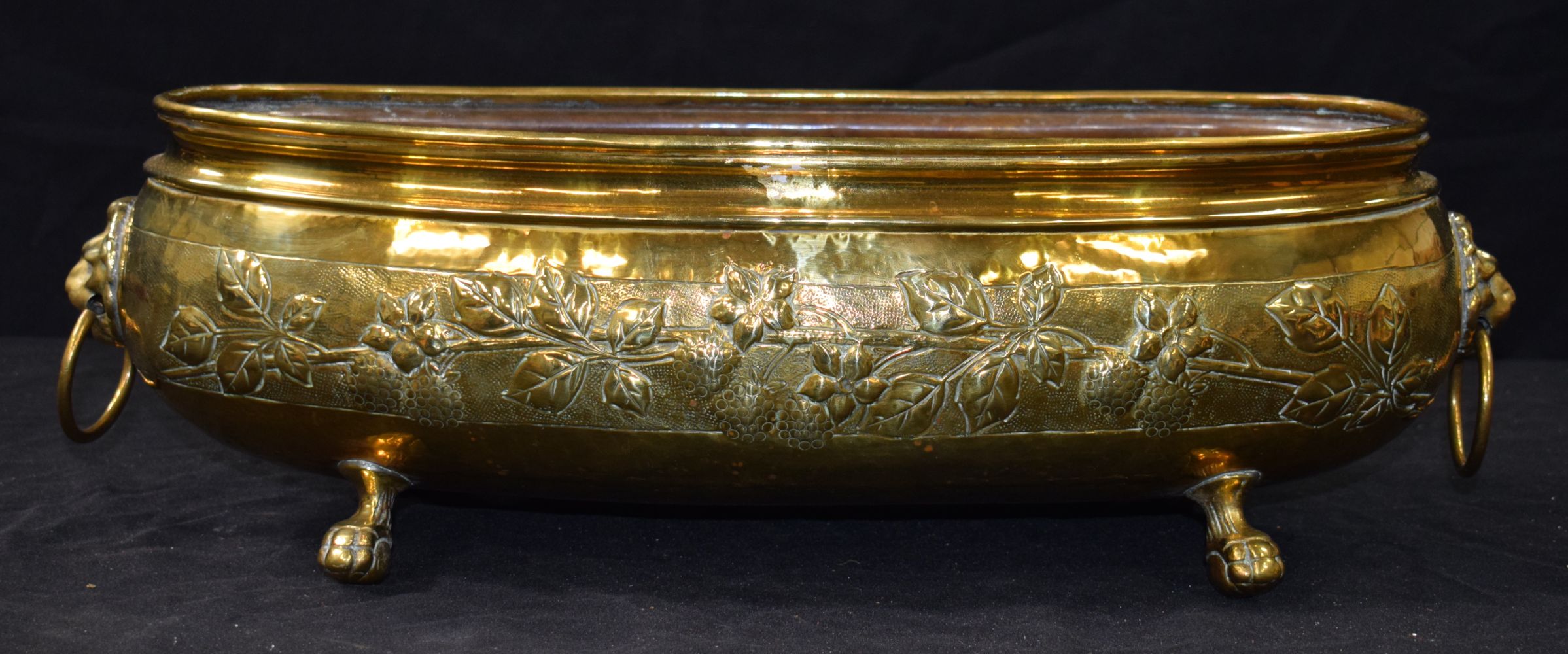 An antique repousse brass planter 19 x 58 cm. - Image 7 of 8