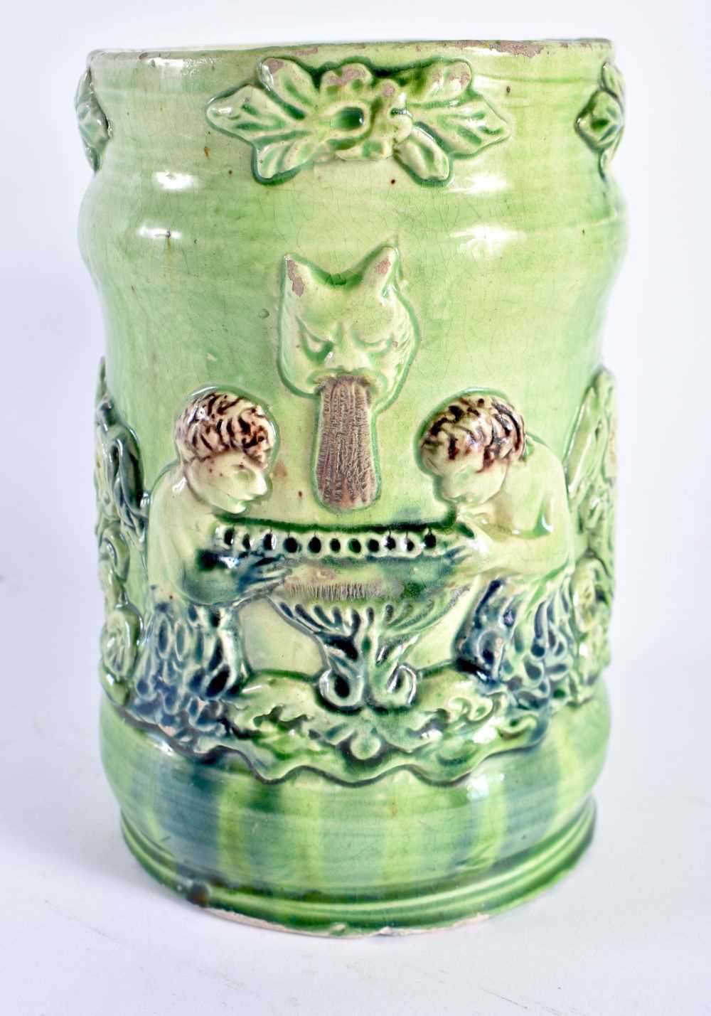 A RARE ANTIQUE GREEN GLAZED WHIELDON TYPE MAJOLICA MUG decorated in relief with figures. 14 cm x - Image 2 of 6