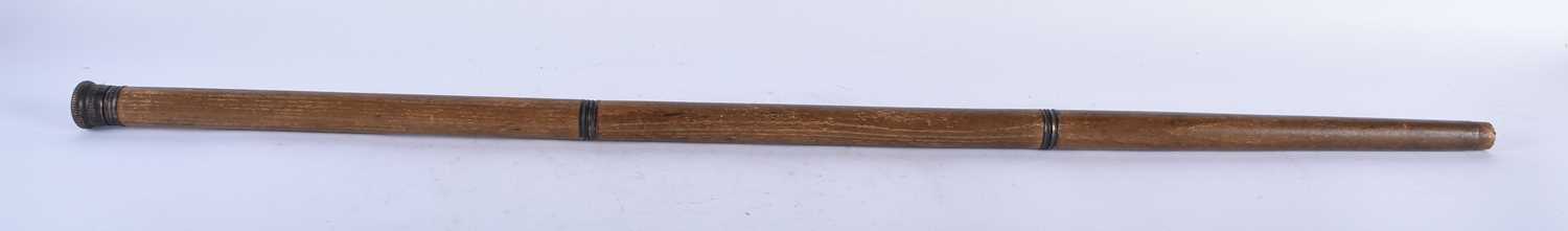 A RARE ANTIQUE COMBINATION WALKING CANE the top opening to reveal a tiny toasting glass, the central