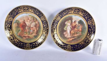 A LARGE PAIR OF LATE 19TH CENTURY VIENNA PORCELAIN DISHES painted with classical figures under a
