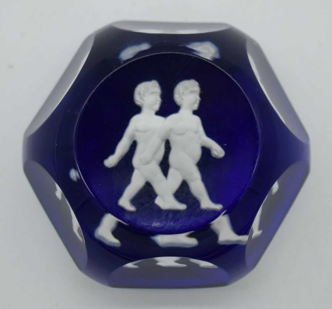 A FRENCH BACCARAT SULPHIDE GLASS PAPERWEIGHT. 325 grams. 6.5 cm x 3.75 cm.