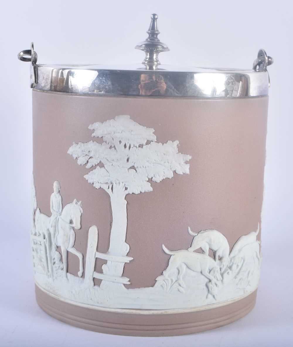 A WEDGWOOD PORCELAIN BISCUIT BARREL with silver plated mounts, decorated with fox hunting scenes