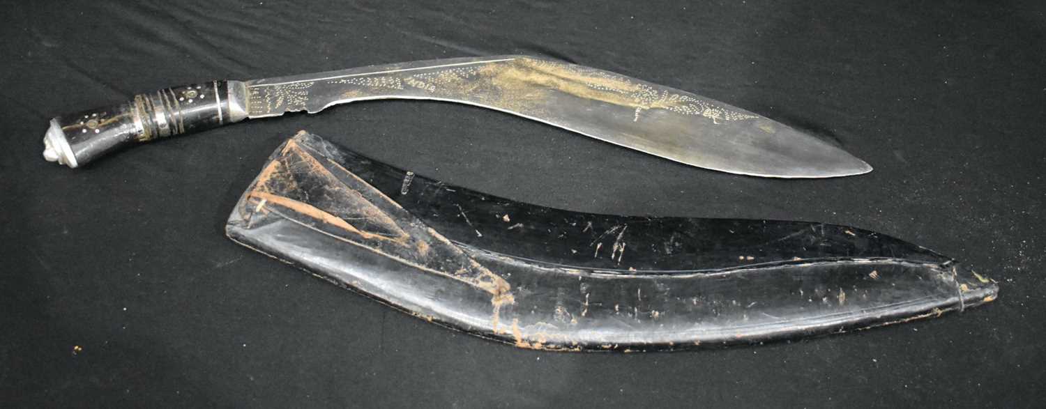 A large Indian Kukri with leather sheath together with a large South American knife with a carved - Image 3 of 12