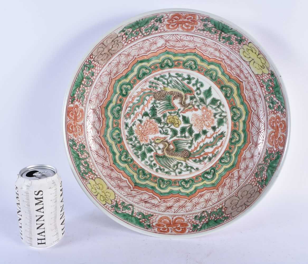 A LARGE 19TH CENTURY CHINESE FAMILLE VERTE PORCELAIN CIRCULAR DISH bearing Kangxi marks to base,