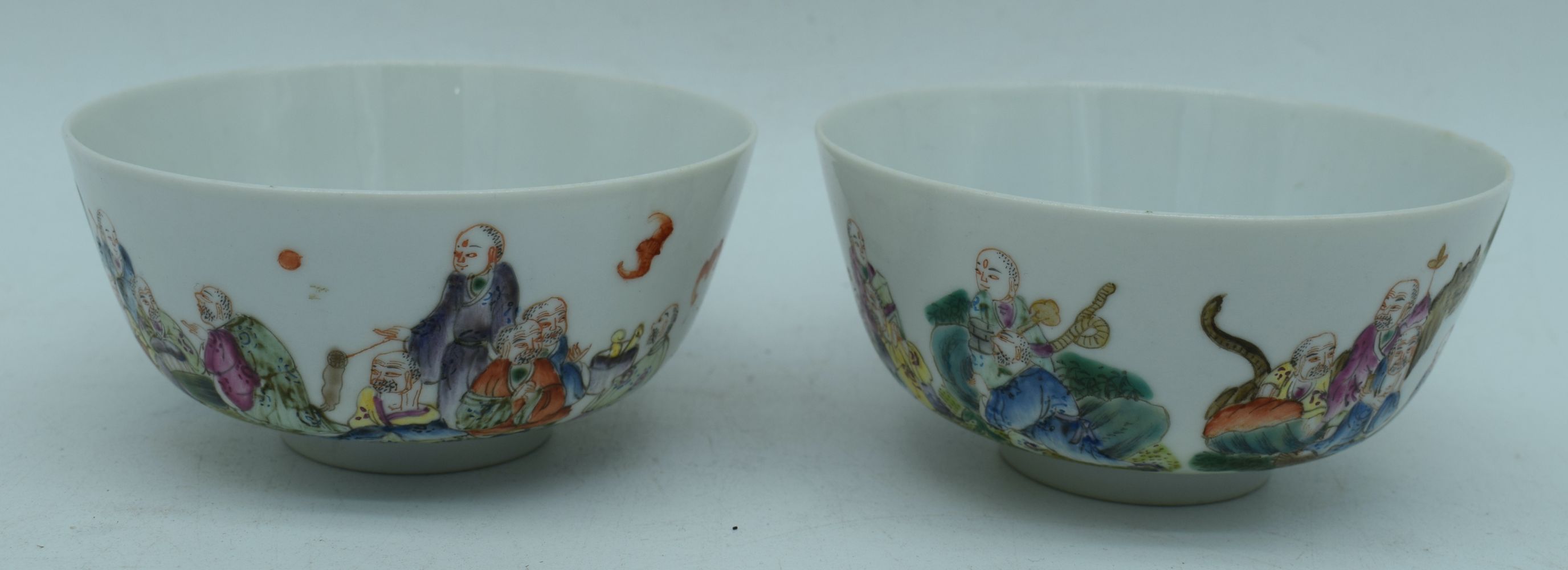 A pair of Chinese porcelain polychrome bowls decorated with figures and bats 6 x 10.5 cm (2). - Image 5 of 6