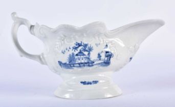 Worcester high-footed sauceboat of scroll-edged rococo shape, moulded with leaf and scroll-edged