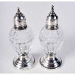 Two Glass Condiments with Silver Mounts. Stamped Sterling. 9.5 cm x 3.6 cm, Weighted bases