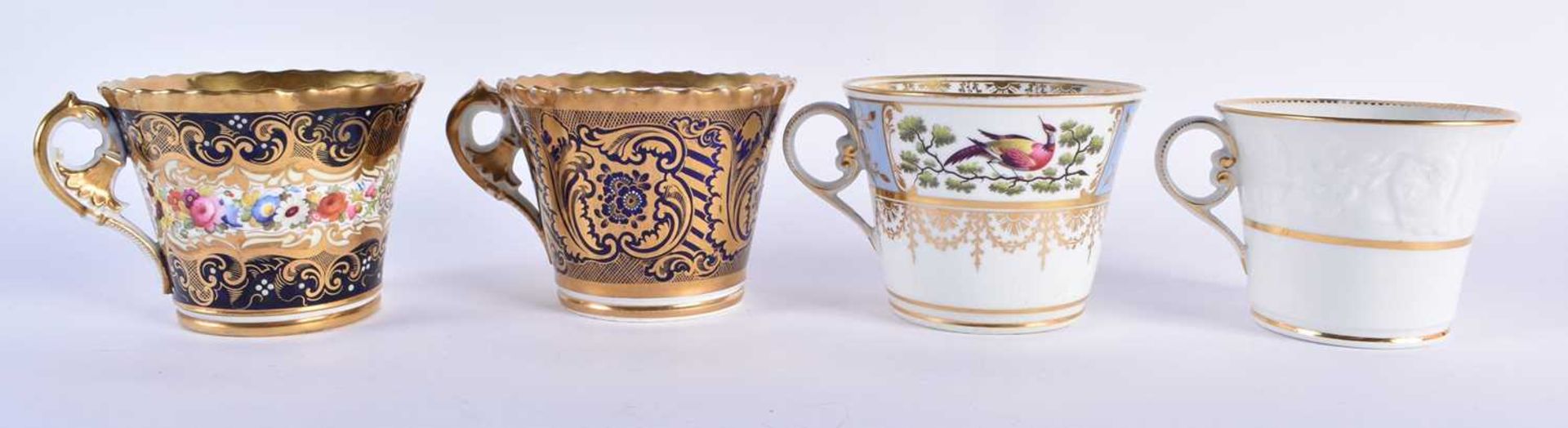 FOUR EARLY 19TH CENTURY LARGE CHAMBERLAINS WORCESTER COFFEE CUPS of varying designs. Largest 8 cm