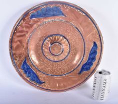 A LARGE EARLY SPANISH HISPANO MORESQUE POTTERY DISH painted with leaves and motifs. 35 cm diameter.