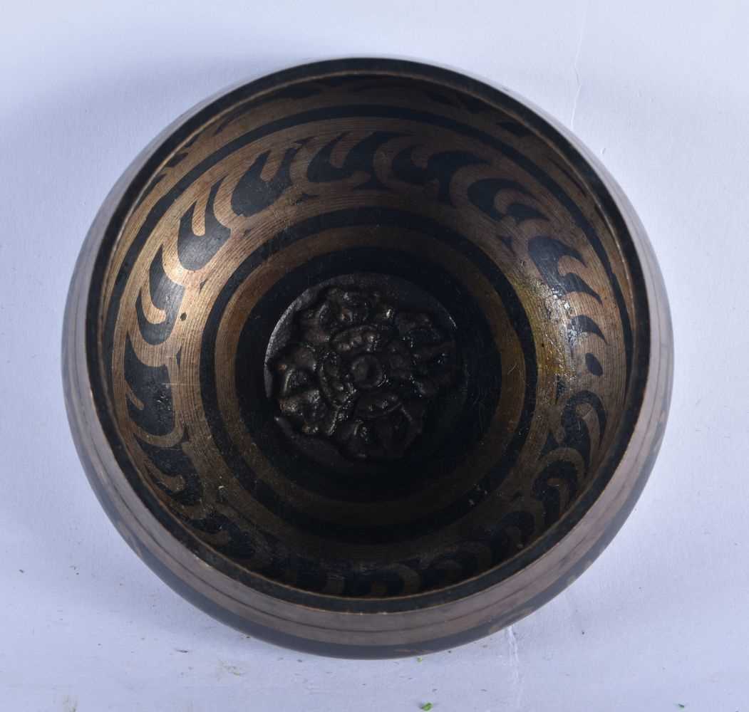 A SMALL TIBETAN NEPALESE GILDED CALLIGRAPHY CENSER. 9 cm diameter. - Image 2 of 3