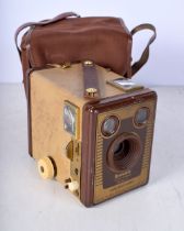 A cased Brownie Six 20 Model F camera 10 x 11.5 x 7.5 cm.