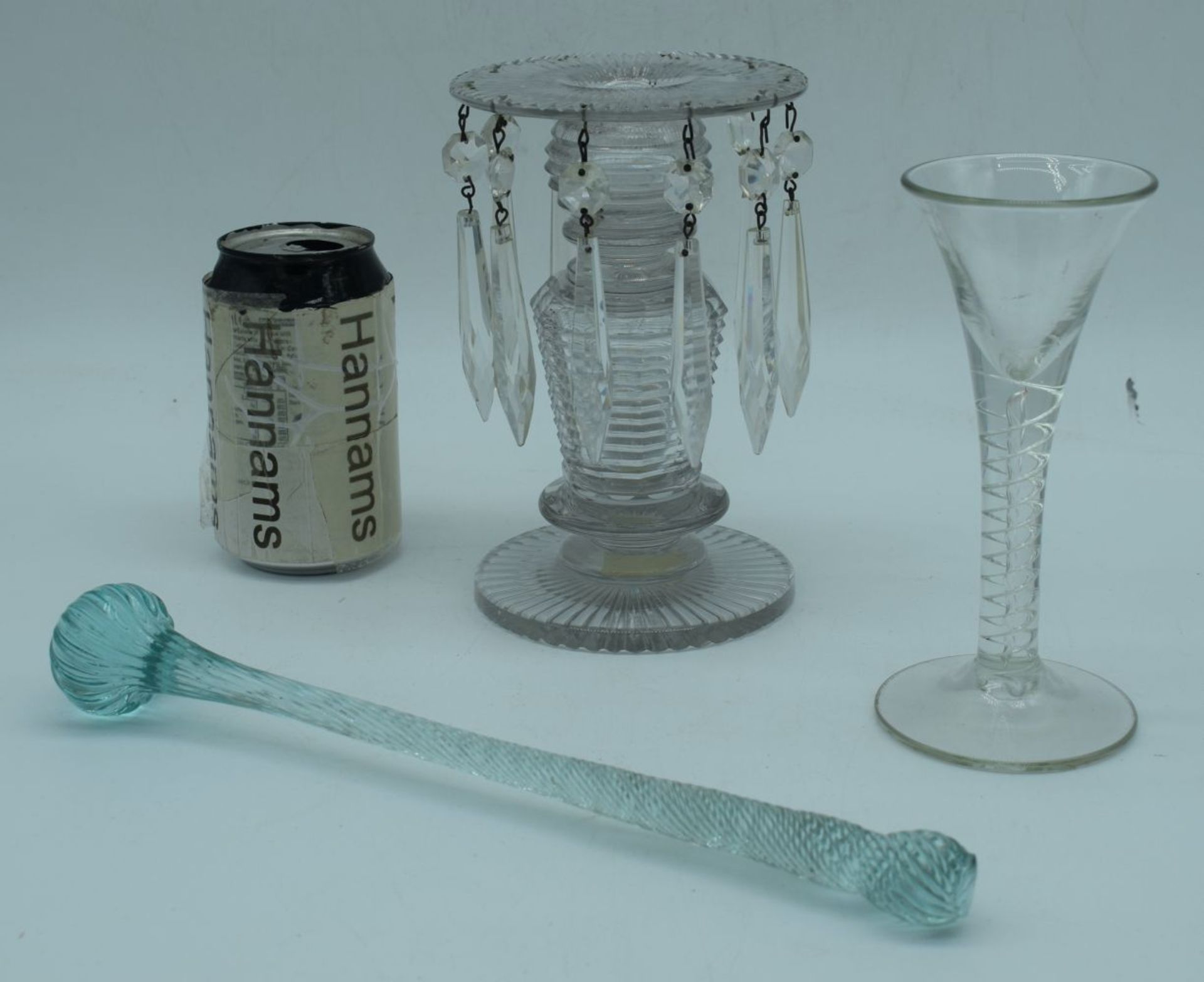 A Victorian glass lustre candle stick together with a Georgian air twist wine glass and a glass