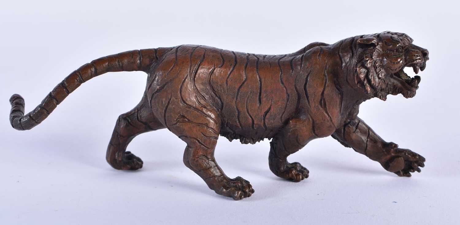 A JAPANESE BRONZE TIGER OKIMONO. 14 cm long.