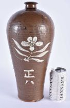 AN UNUSUAL LARGE CHINESE QING DYNASTY STONEWARE MEIPING VASE subtly enamelled with a flower and