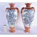 A LARGE PAIR OF 19TH CENTURY JAPANESE MEIJI PERIOD SATSUMA VASES painted with figures within