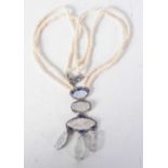 A Double Strand Pearl Necklace with a Moonstone, Sapphire and Diamond Pendant. Length 45cm, weight