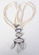 A Double Strand Pearl Necklace with a Moonstone, Sapphire and Diamond Pendant. Length 45cm, weight