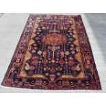 A Persian Bakhtiari rug 214 x 149 cm