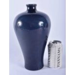 A CHINESE QING DYNASTY BLUE MONOCHROME PORCELAIN VASE bearing Wanli marks to base. 27 cm high.