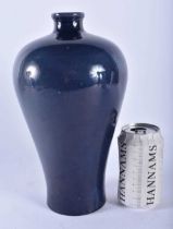 A CHINESE QING DYNASTY BLUE MONOCHROME PORCELAIN VASE bearing Wanli marks to base. 27 cm high.