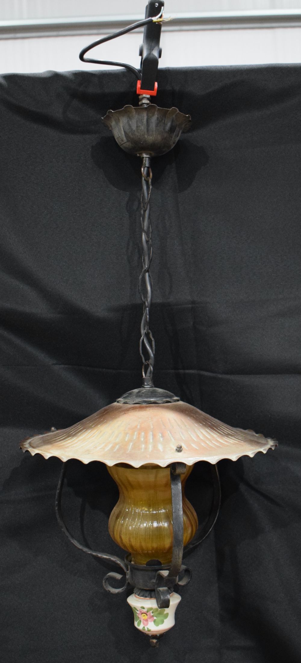 A early 20th Century Ceiling light with Copper and wrought iron top and supports 75 cm.