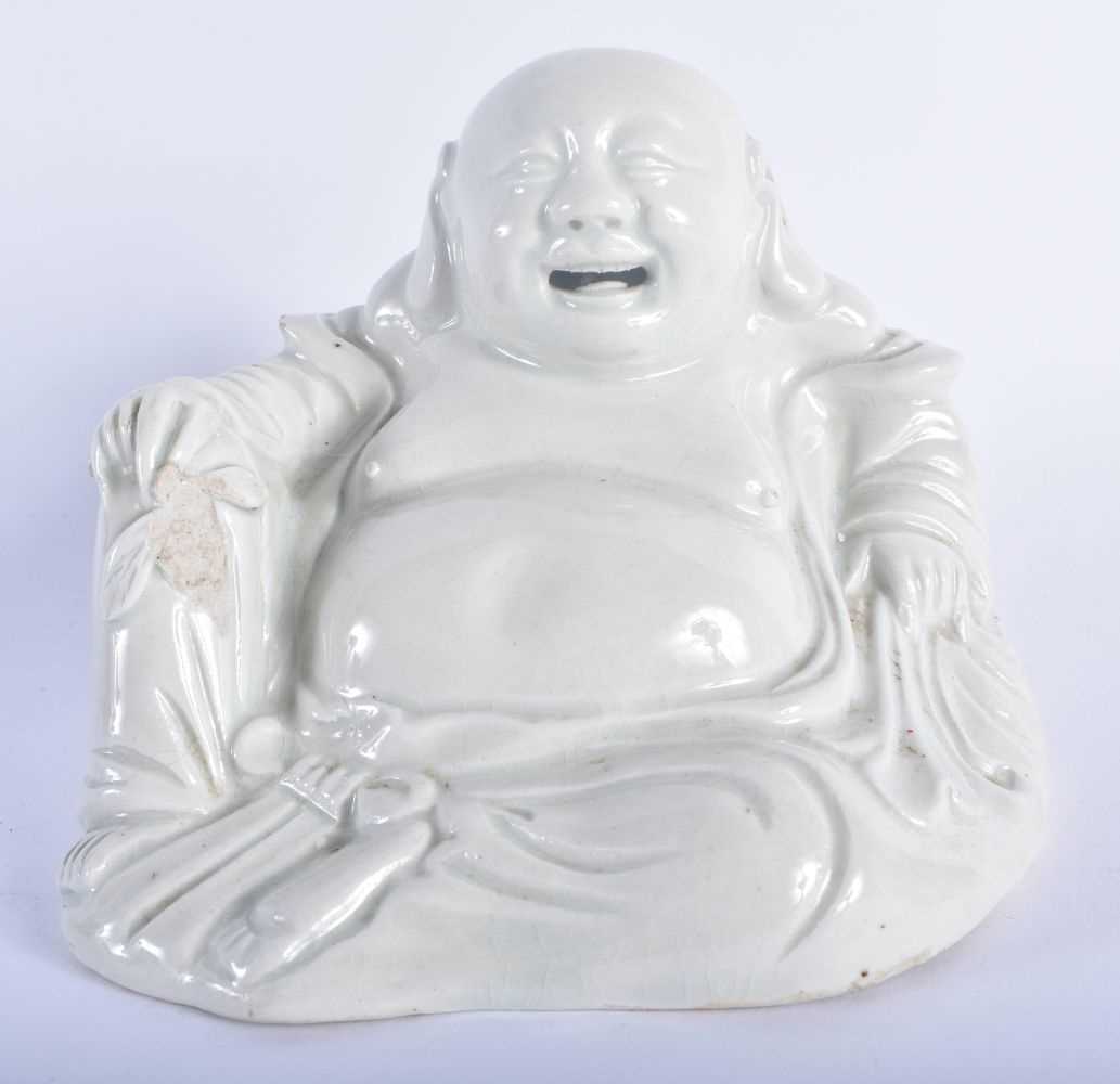 A CHINESE QING DYNASTY BLANC DE CHINE PORCELAIN FIGURE OF A BUDDHA. 12 cm x 10 cm.