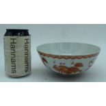 A Chinese porcelain Rouge de Fer bowl decorated with Foo Dogs 7 x 16 cm.